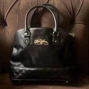 Betsy Johnson leather dome bag with 3 main compartments. Excellent condition